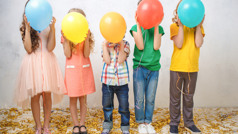 Kids with balloons